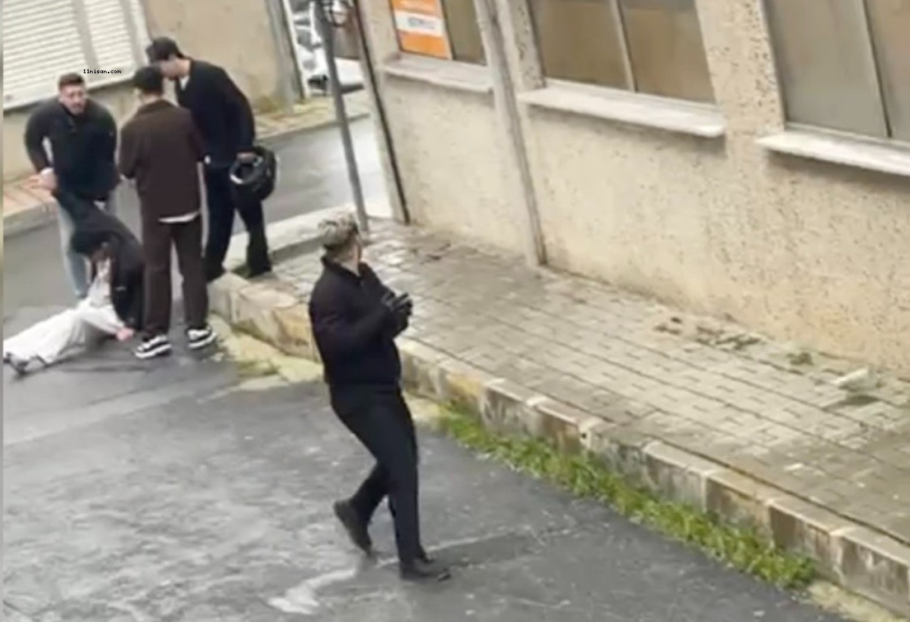 Tartıştıkları genci sokak ortasında acımasızca dövdüler...;
